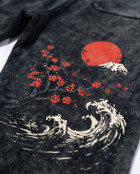 Close up of the rising sun, cherry blossom and wave print