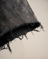 Close up of the raw cut frayed hem