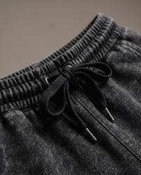 Close up of the waistband and black drawcord
