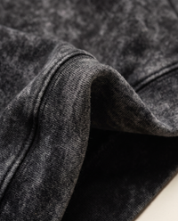 Close up of the heavyweight brushed fleece and mineral wash texture